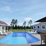 Mazurskie Wzgórze-domki Z Basenem Casa de Férias